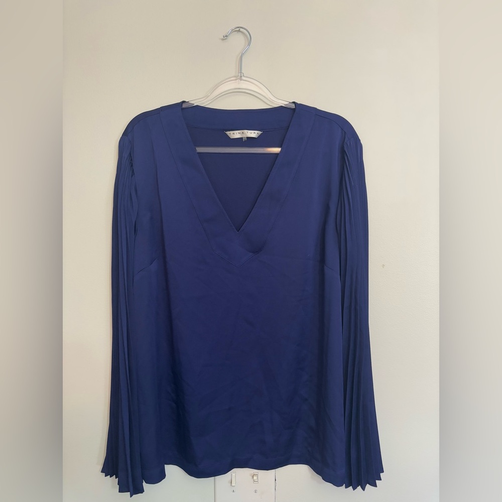 Trina Turk Split V-Neck Top With Accordion-Pleated Long Sleeves